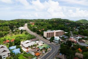 an aerial view of a town with a road at Студия вид на бассейн Раваи 418 by IBG Property in Phuket Town