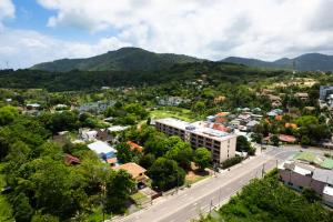 an aerial view of a city with a road at Студия вид на бассейн Раваи 418 by IBG Property in Phuket Town