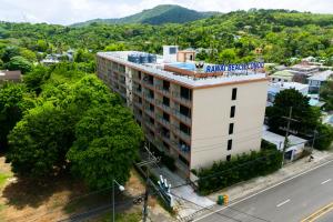 an overhead view of a building with a sign on it at Студия вид на бассейн Раваи 418 by IBG Property in Phuket Town