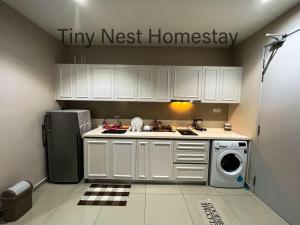 A cozinha ou kitchenette de Tiny Nest Homestay - iCity Shah Alam with Free WIFI, 5 minutes to UITM