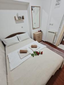 Giường trong phòng chung tại Central Peaceful Nest Belgrade