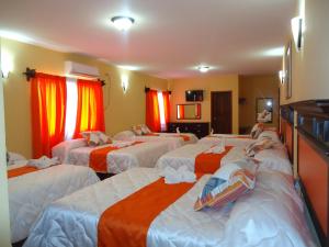 Katil atau katil-katil dalam bilik di Hotel Las Hamacas