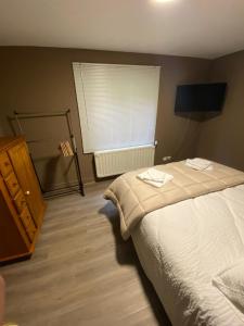 Ein Bett oder Betten in einem Zimmer der Unterkunft Chez Mo
