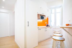 Kuchyň nebo kuchyňský kout v ubytování Sunscape Rooms Cagliari City Center