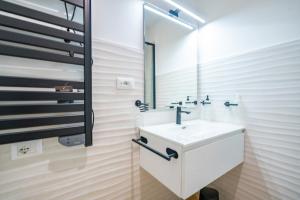 Koupelna v ubytování Sunscape Rooms Cagliari City Center