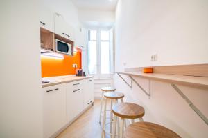 Kuchyň nebo kuchyňský kout v ubytování Sunscape Rooms Cagliari City Center