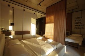 Postel nebo postele na pokoji v ubytování Hotel Nobilis Hall