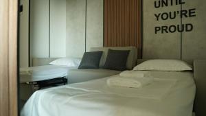 Postel nebo postele na pokoji v ubytování Hotel Nobilis Hall