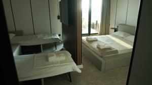 Postel nebo postele na pokoji v ubytování Hotel Nobilis Hall