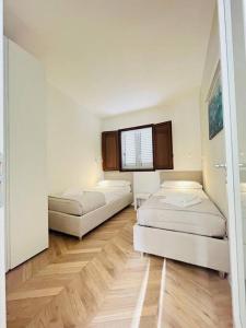 Postel nebo postele na pokoji v ubytování Resort Estia