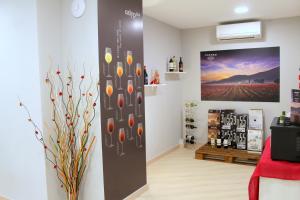 TV a/nebo společenská místnost v ubytování Hostal Aslyp 114