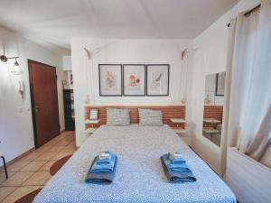 Postel nebo postele na pokoji v ubytování BNB La Piccola - Free Parking