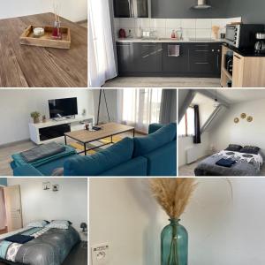 uma cozinha e uma sala de estar com um sofá azul em Maison Mitoyenne avec cour + parking em Sainte-Savine