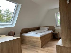 Postel nebo postele na pokoji v ubytování Waldhotel Eichenhof