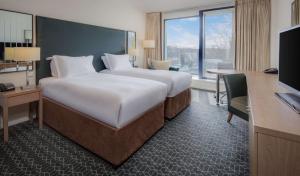 Cama ou camas em um quarto em Hilton Dublin Kilmainham
