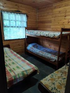 Postel nebo postele na pokoji v ubytování Sítio Casarão + 62 fotografií