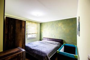 Postel nebo postele na pokoji v ubytování Ferienwohnung in Feldkirchen Dagmar und Christian!