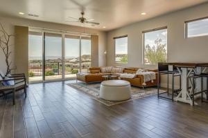 a living room with a couch and a table at Washington Home with Pool Access about 32 Mi to Zion NP! in Washington