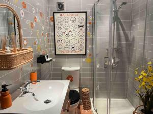 a bathroom with a shower and a sink and a shower at Revival Retreat, with parking in Whitstable