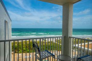 a balcony with a view of the ocean at Emerald on the Water - Formerly Belleair Beach Club in Clearwater Beach