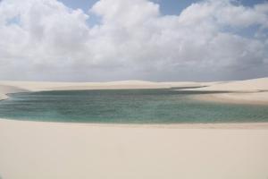a view of a beach with sand dunes and water at Rancho Dias in Atins