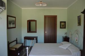 Кровать или кровати в номере Agriturismo Donna Beatrice