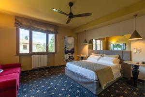 Postel nebo postele na pokoji v ubytování Holiday Rooms Antica Badia