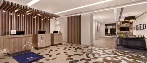 コベントリーにあるDoubleTree by Hilton Coventry Building Society Arenaの建物内の受付のあるロビー