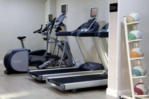 a gym with several exercise bikes in a room at DoubleTree by Hilton York in York