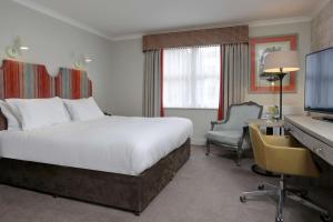 Postel nebo postele na pokoji v ubytování DoubleTree by Hilton York