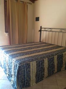 Postel nebo postele na pokoji v ubytování Hotel Borgo Antico