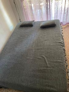 Postel nebo postele na pokoji v ubytování CALAFELL 5 BEACH