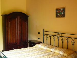 Postel nebo postele na pokoji v ubytování Hotel Borgo Antico