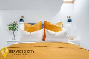 Postel nebo postele na pokoji v ubytování SCA - Charming City Studio - VS6