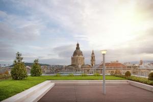 a view of the city of london with a street light at Hilton Garden Inn Budapest City Centre in Budapest