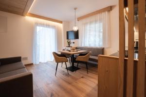 TV a/nebo společenská místnost v ubytování Aparthotel Zum Schlössl
