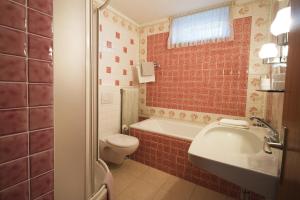 Fotografie z fotogalerie ubytování Gästehaus Libelle v destinaci Millstatt