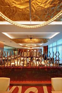 a row of dance equipment in a hotel lobby at Hilton Frankfurt Airport in Frankfurt/Main