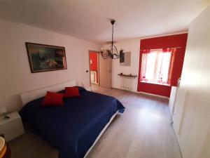 Posteľ alebo postele v izbe v ubytovaní House Vittone Venaria Reale