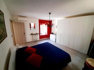 Posteľ alebo postele v izbe v ubytovaní House Vittone Venaria Reale