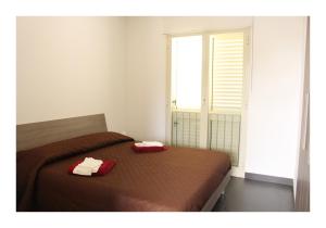 Cama ou camas em um quarto em The Green Seaside