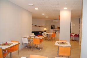 Kuchyň nebo kuchyňský kout v ubytování Hostal Aslyp 114