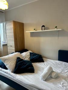 Postel nebo postele na pokoji v ubytování Gdańsk Old Town Apartment