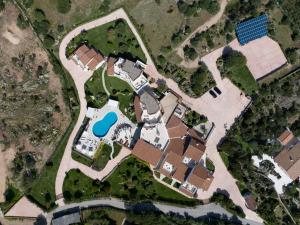 an overhead view of a house with a pool at Sulià House Porto Rotondo, Curio Collection by Hilton in Porto Rotondo