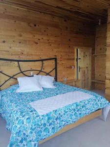 Postel nebo postele na pokoji v ubytování Rimusa Inn