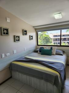 Postelja oz. postelje v sobi nastanitve Flat Nannai Residence