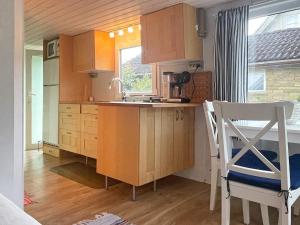 A kitchen or kitchenette at 4 person holiday home in SÖLVESBORG-By Traum