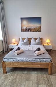 Postel nebo postele na pokoji v ubytování L118 Vermietungen