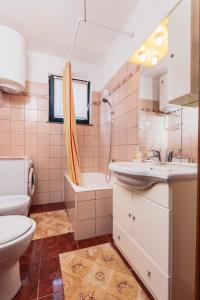 Ein Badezimmer in der Unterkunft Andela Apartment