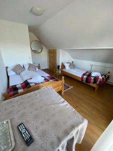 Кровать или кровати в номере Pensiunea Agroturistica Casa Tarta